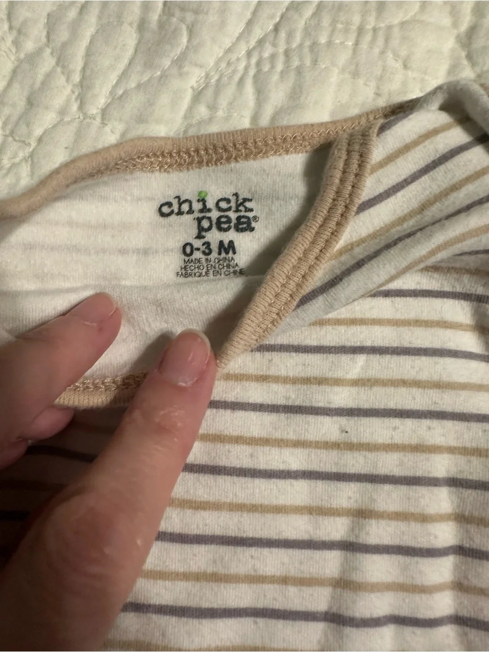 0287 4 piece set of footed PJs and onesies size 0-3 and newborn